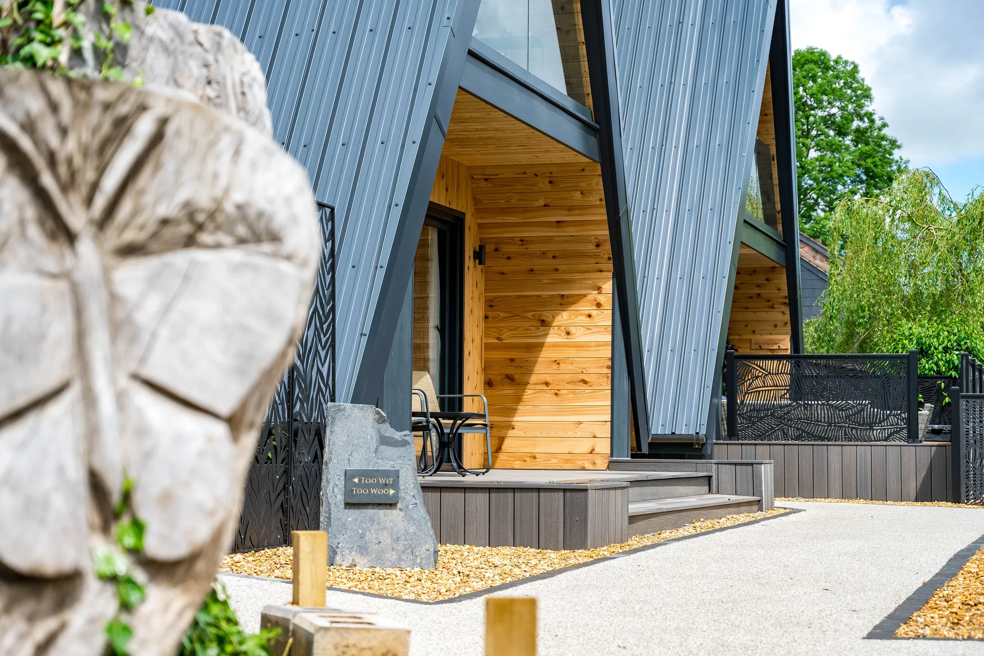 Two completed A-frame lodges built by Sanctuary Estates